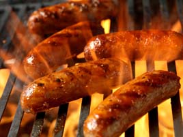 Enjoying sausages fresh off the barbecue