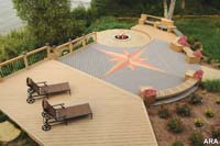 Complete with curved benches, planter boxes and a multi-colored compass rose inlay, custom homebuilder Scott Gregory designed his outdoor living area with innovation and functionality in mind.