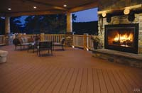 Upgrading your deck with composite material and a fireplace