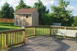 These wood deck rails provide saftey and style